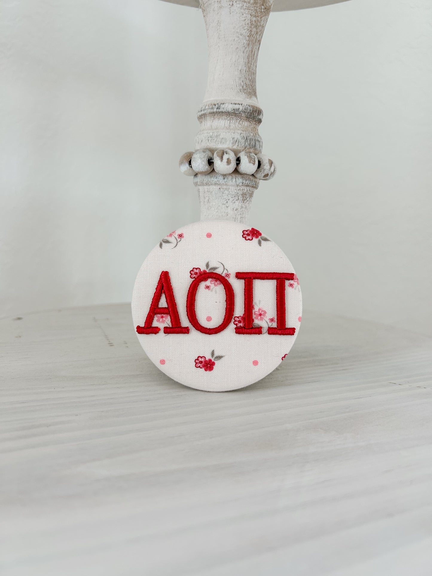 AOπ Embroidered Button