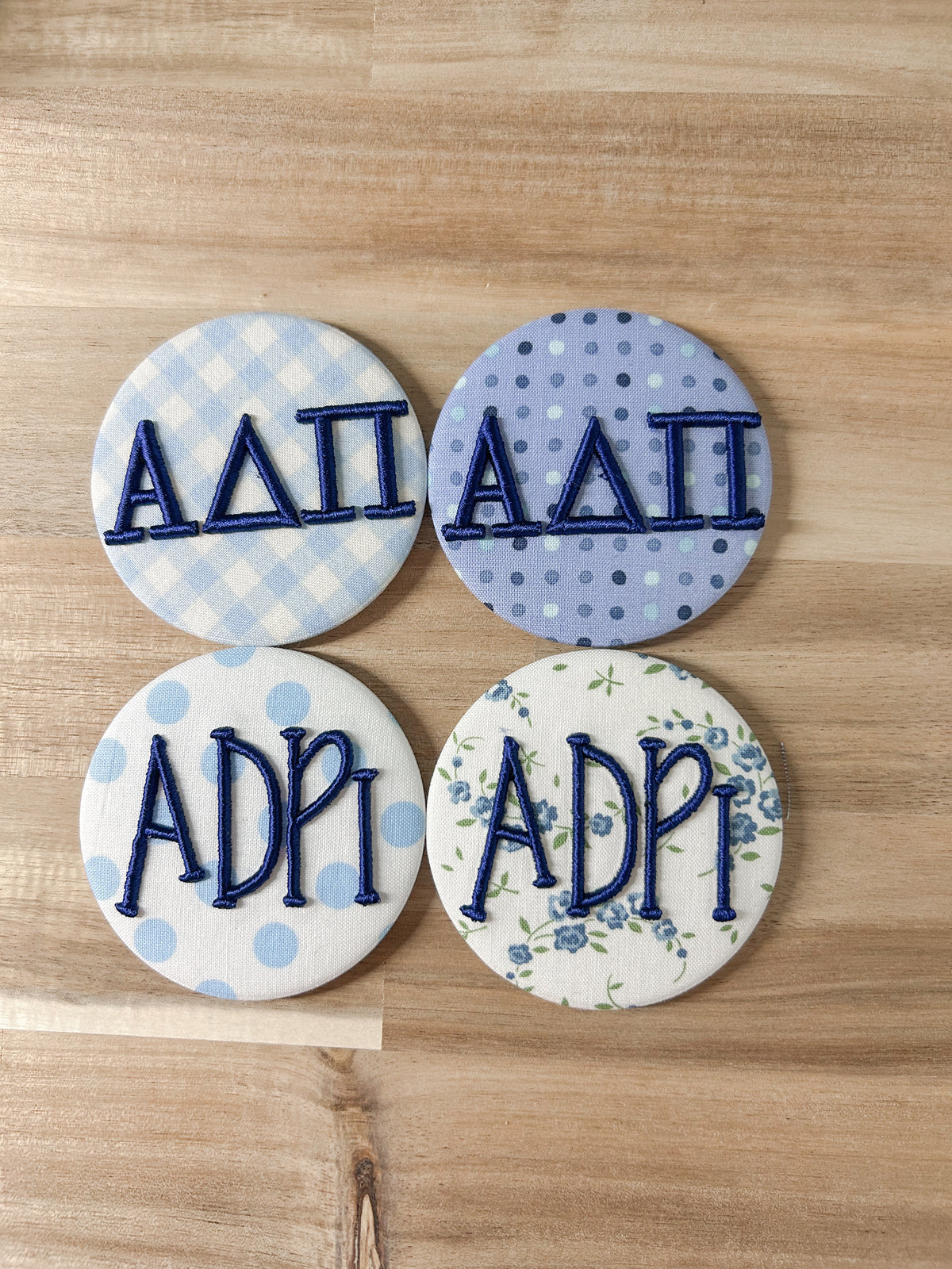 A∆π Embroidered Button