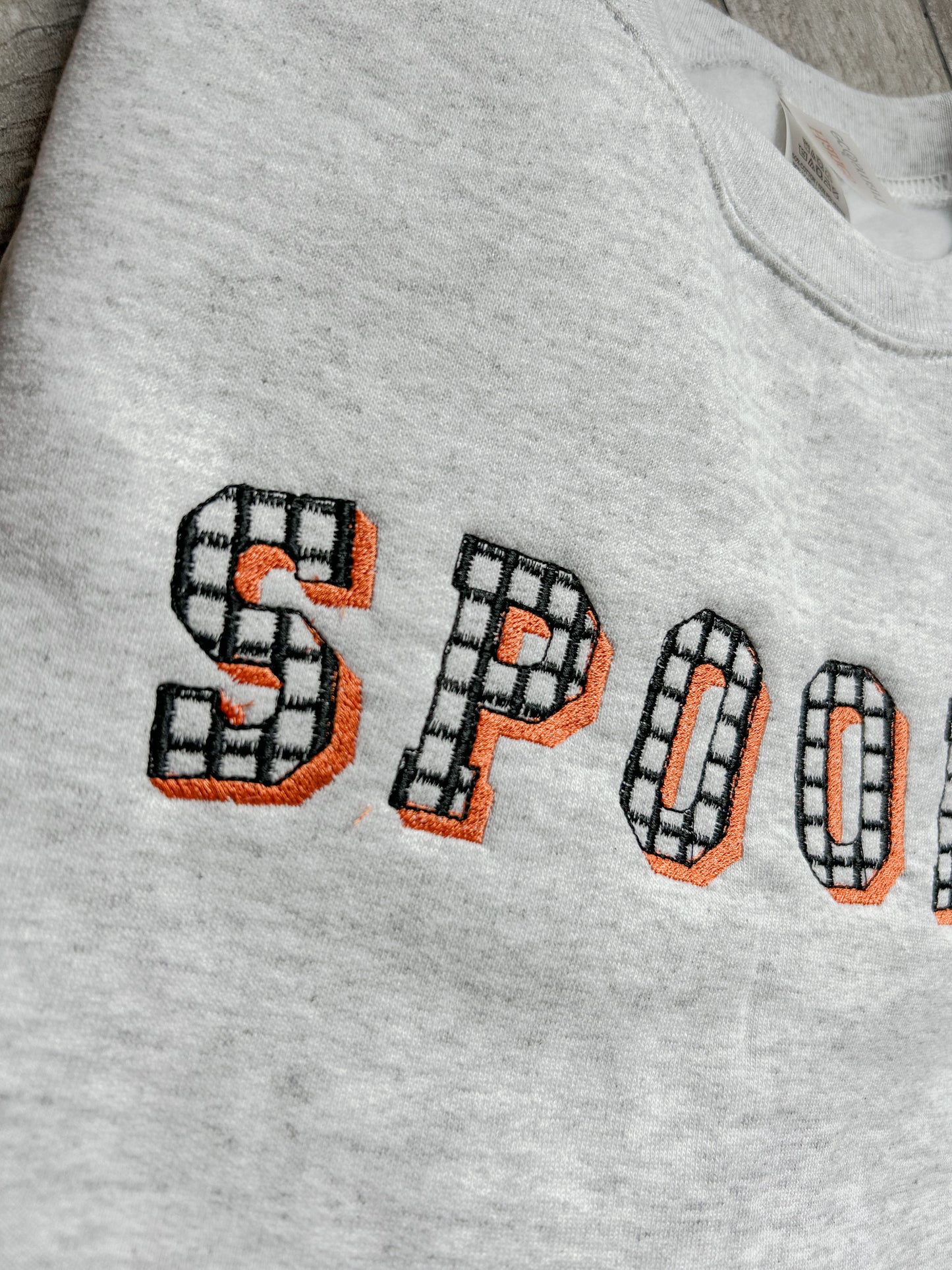 Spooky Checkered Sweater