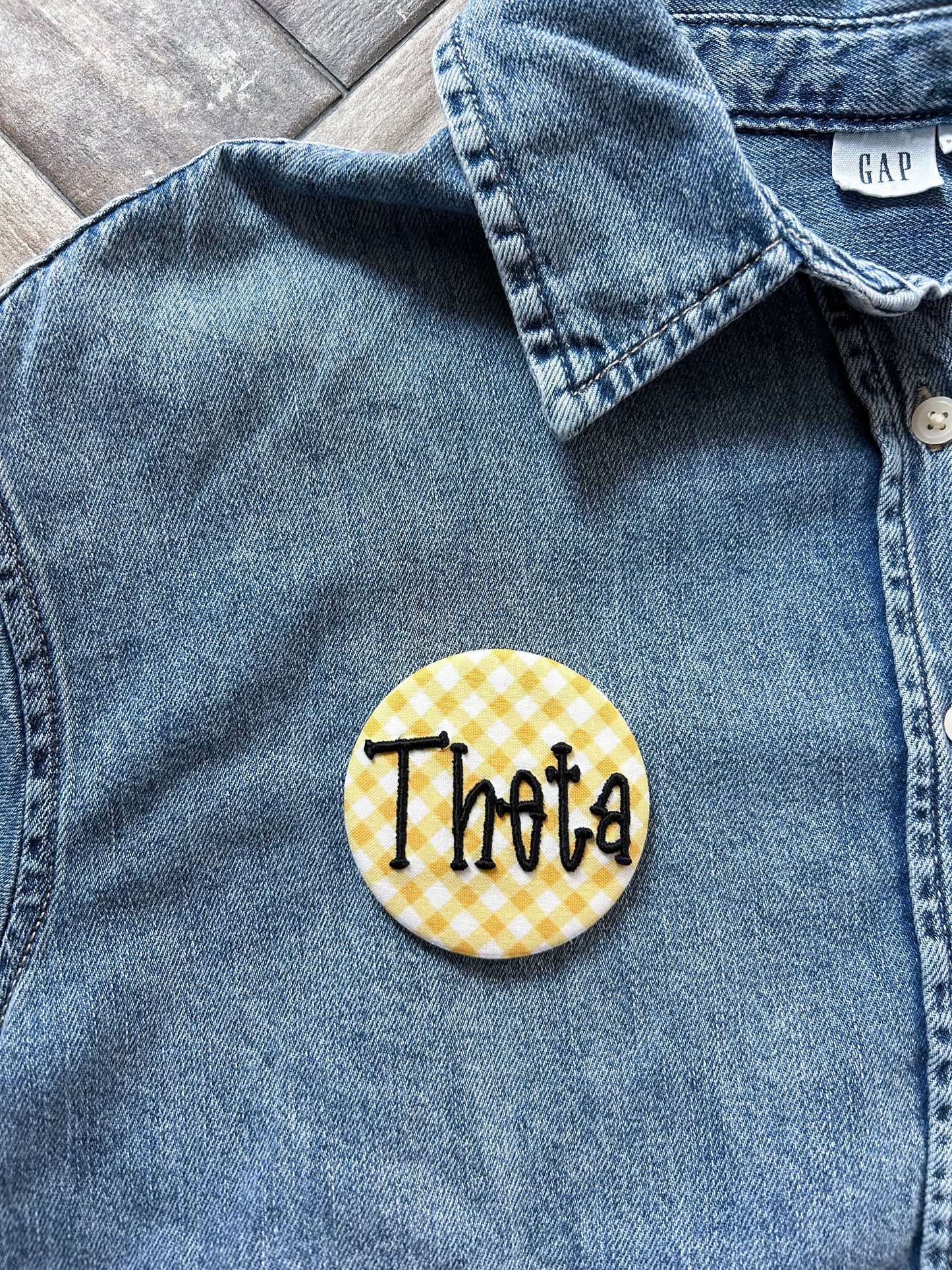 Theta Embroidered Button