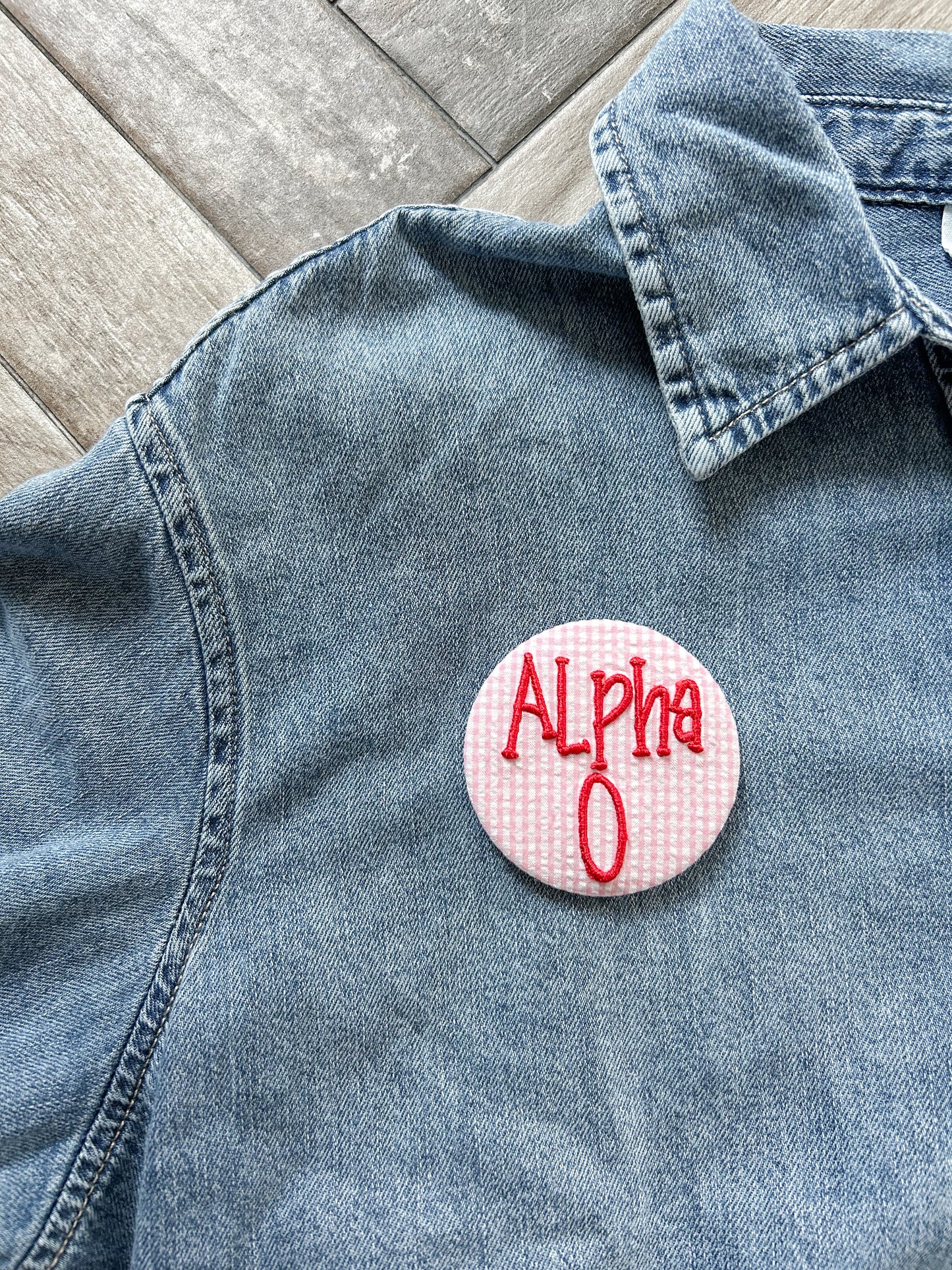 Alpha O Embroidered Button