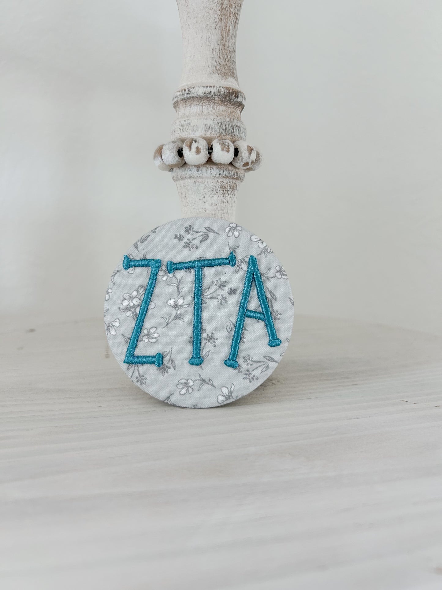 ZTA Embroidered Button
