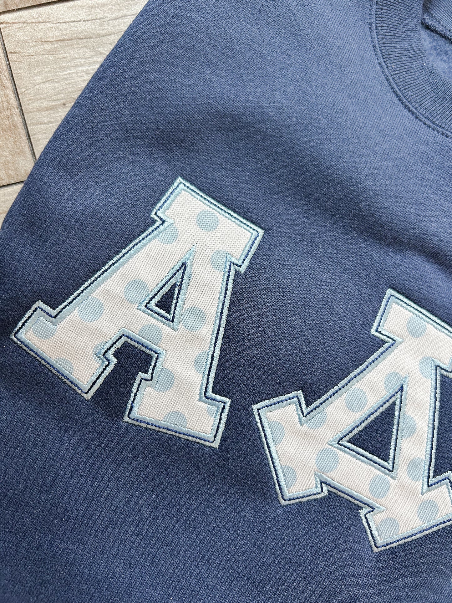 A∆π Embroidered Sweatshirt